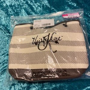 Thirty-One Canvas Crew Mini in Taupe Straw Stripe with monogrammed K in brown.